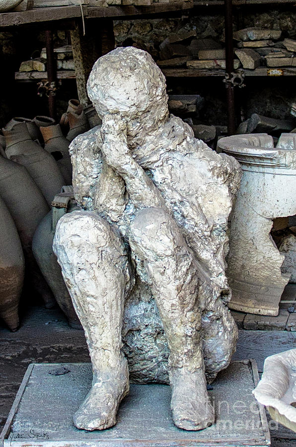 Cast Of A Crouching Man Pompeii Victim Photograph