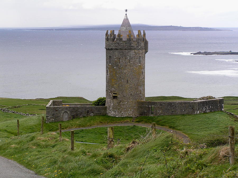 Castle by the Sea in Ireland Photograph by Jeanette Oberholtzer