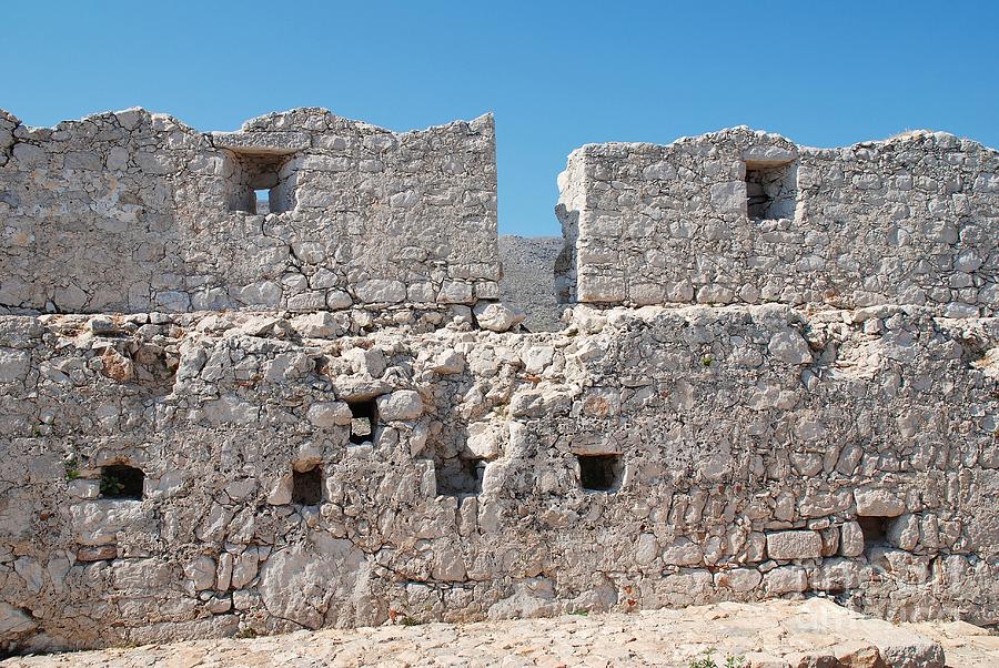 Castle wall on Halki Photograph by David Fowler