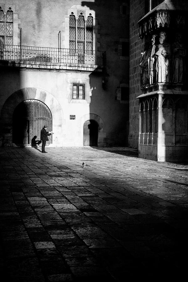Catching Up On The News In Tarragona Spain Bw Photograph
