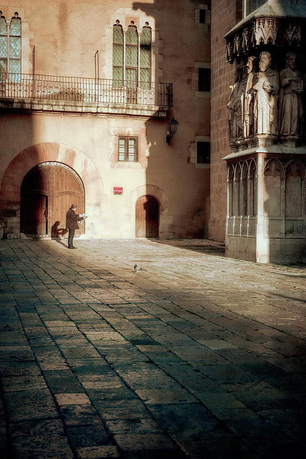 Catching up on the News in Tarragona Spain Vintage Photograph by Joan Carroll