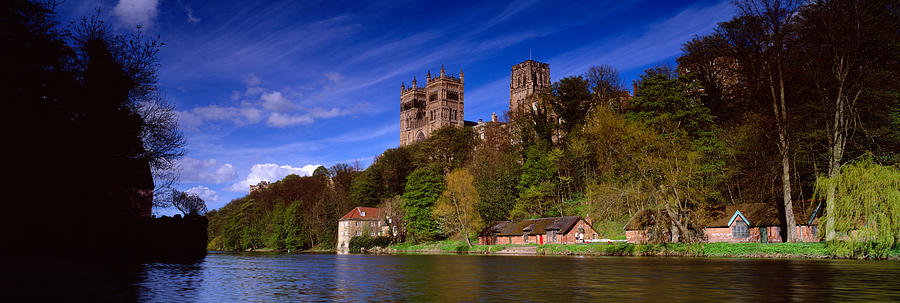 Cathedral Building Along A River Photograph by Panoramic Images
