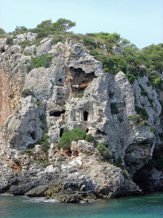 Caves at Cales Coves Photograph by Rod Johnson