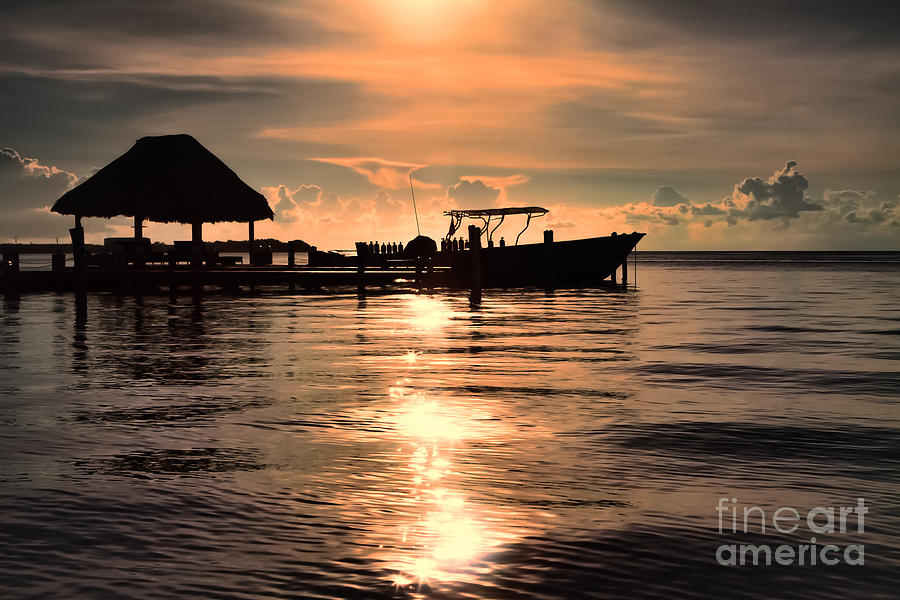 Caye Caulker at Sunset Photograph by Lawrence Burry