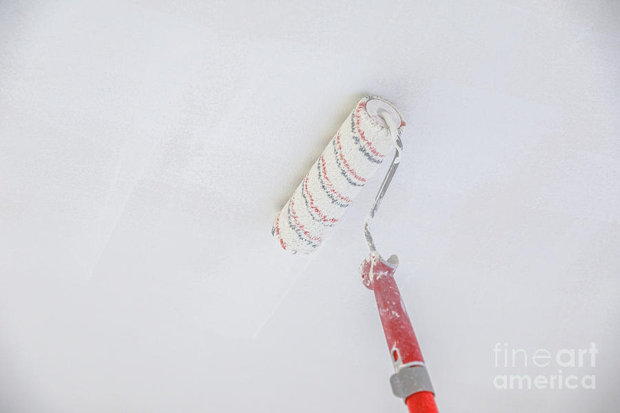 Ceiling paint roller Photograph by Benny Marty