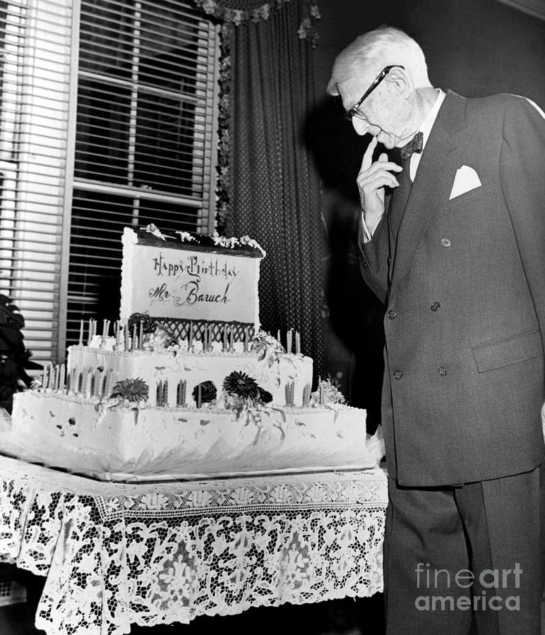 Celebrating his 93rd Birthday, Bernard Baruch samples the icing of his ...