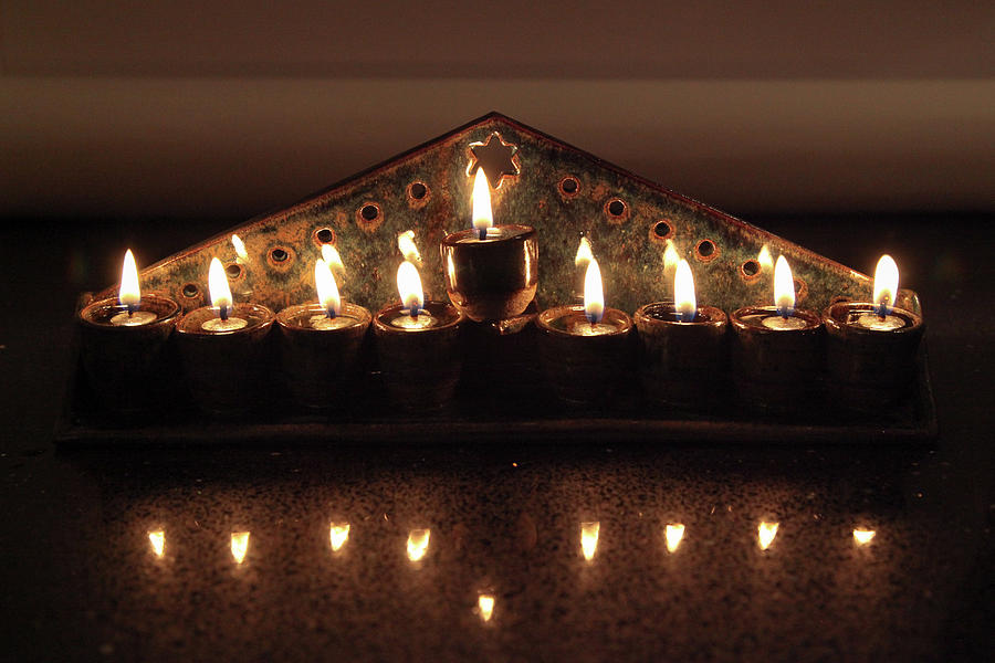Hanukkah Photograph - Ceramic Chanukkiah Lit With Eight Lights And One Lighter, The Shamash by Yoel Koskas