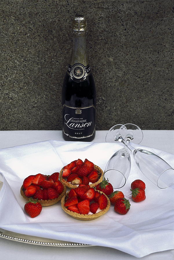 Champagne Bottle With Strawberry Tarts And 2 Glasses Photograph by Sally Weigand