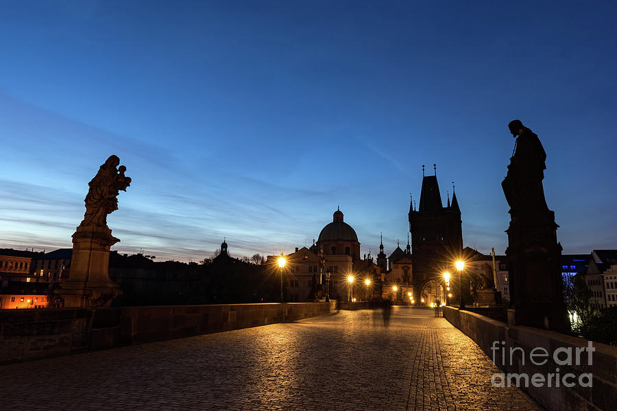 Charles Bridge at sunrise, Prague, Czech Republic. Dramatic statues and medieval towers. Photograph by Michal Bednarek