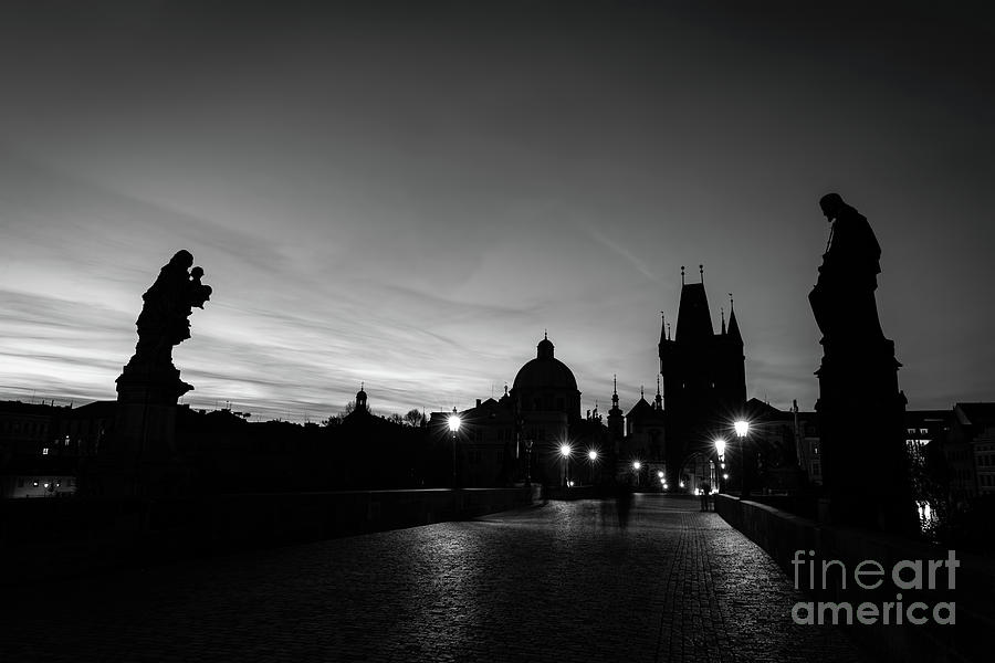 Charles Bridge at sunrise, Prague, Czech Republic. Statues, medieval towers in black and white Photograph by Michal Bednarek