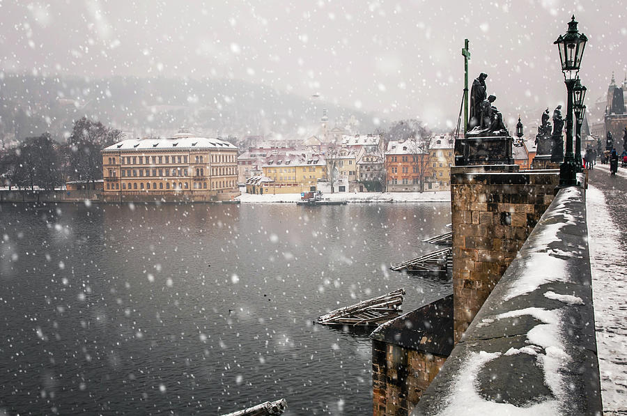 Charles Bridge under Snow. Wintry Prague Photograph by Jenny Rainbow