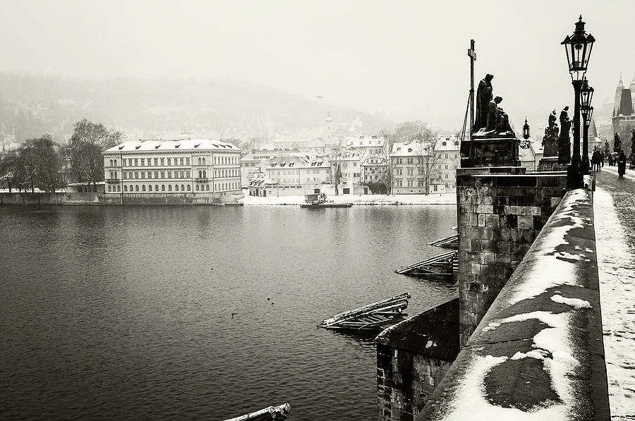 Charles Bridge under Snow. Wintry Prague. Monochrome Photograph by Jenny Rainbow