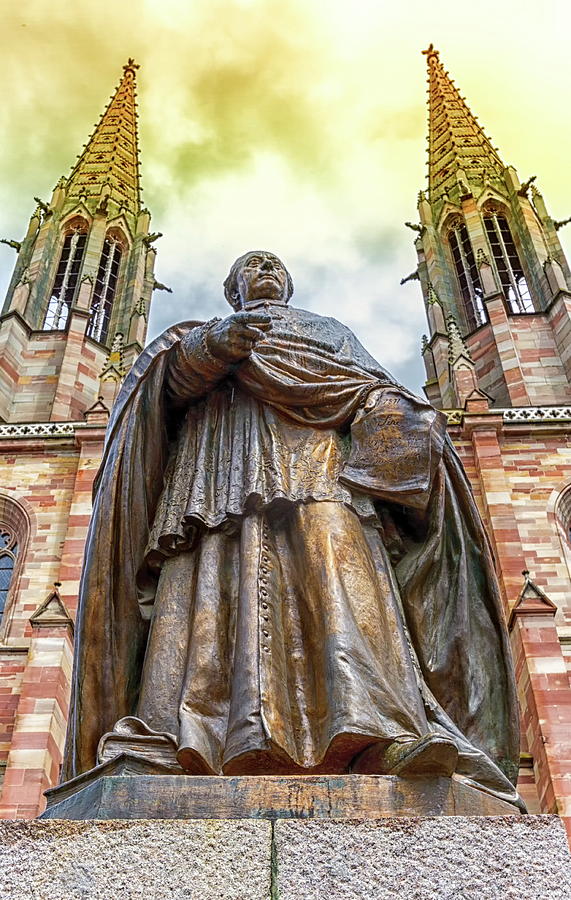 Charles-Emile Freppel statue in front of Saints-Pierre-et-Paul-Church in Obernai, France Photograph by Elenarts - Elena Duvernay photo