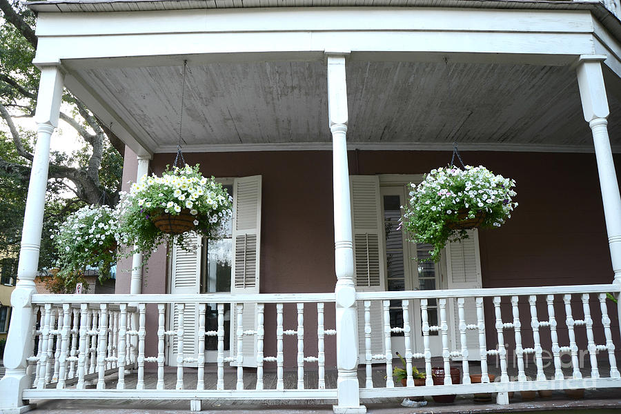 Charleston Historical Homes - Front Porches Hanging Summer Baskets of Flowers Photograph by Kathy Fornal