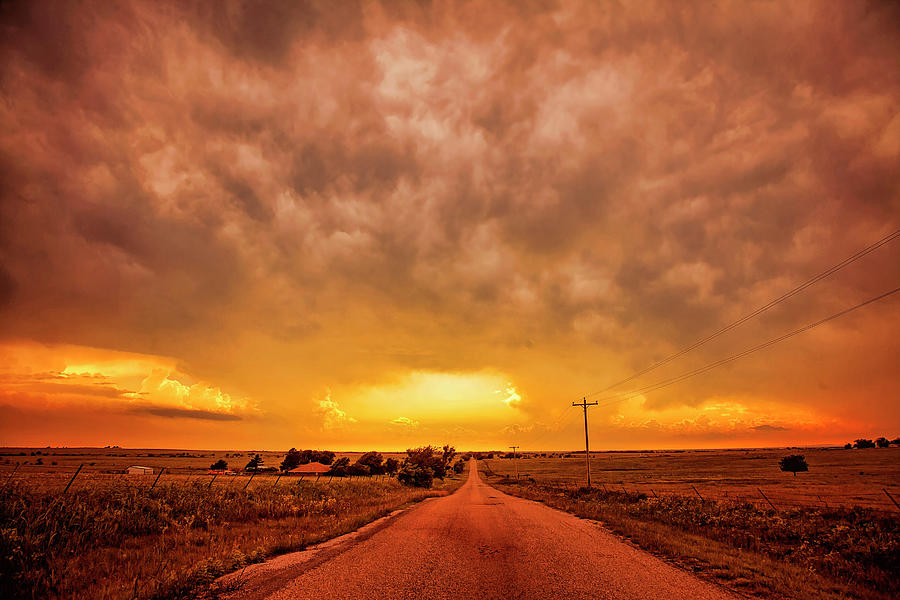 Chasing the Sunset Photograph by Toni Hopper