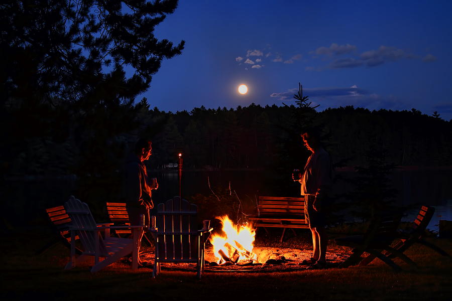 Chatting By the Campfire Under the Full Moon Photograph by Dale Kauzlaric