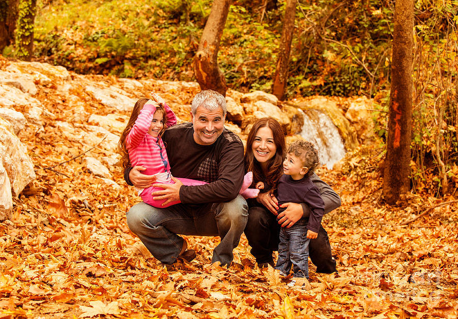 Cheerful family in autumn woods Photograph by Anna Om