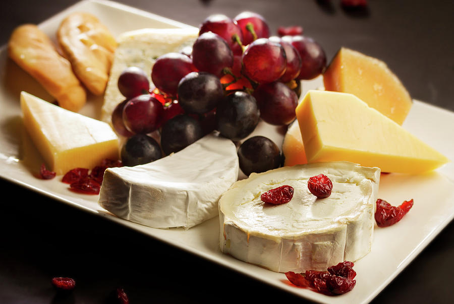 Cheese Plate on Black Photograph by Anastasy Yarmolovich