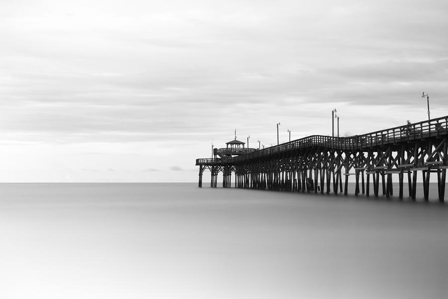 Black And White Photograph - Cherry Grove Pier by Ivo Kerssemakers