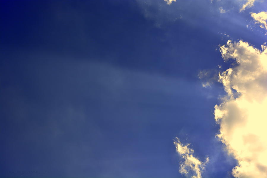 Cherub Cloud and Blessings Sun Rays Photograph by Kathy Barney