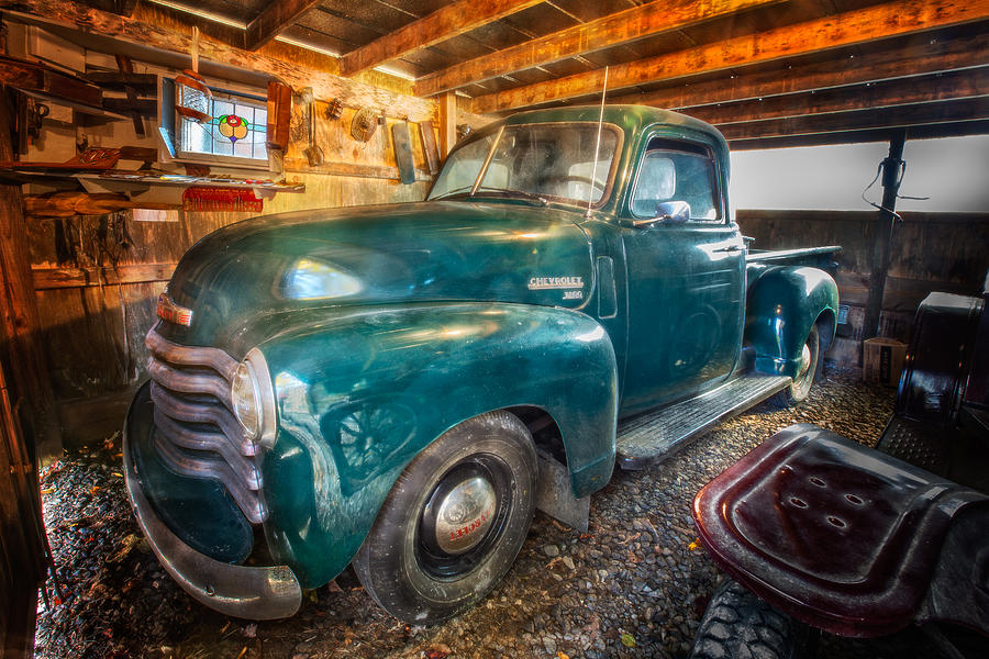 Chevrolet in the Garage Photograph by Debra and Dave Vanderlaan