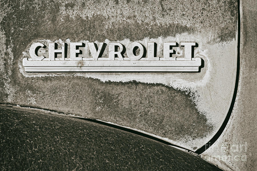 Chevrolet Logo and Rust bw Photograph by Jerry Fornarotto
