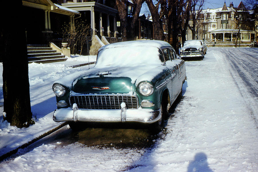 Chevy Bel Air Parked in the Cold Snow Covered Street in Philadel Photograph by Wernher Krutein