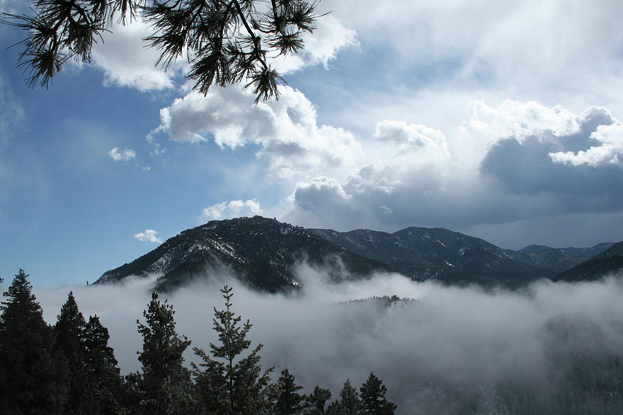 Cheyenne Mountain Enveloped in Clouds Photograph by Ric Bascobert