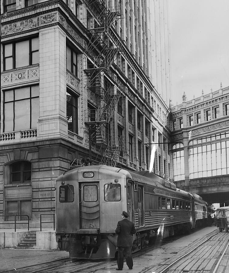 Chicago and North Western Train Alongside Wrigley Building Photograph by Chicago and North Western Historical Society