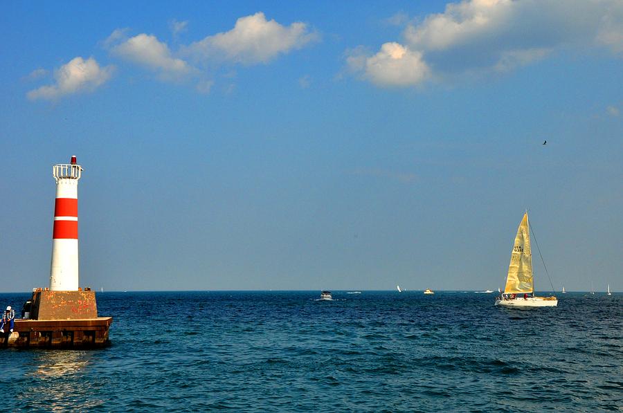 Chicago Harbor Entrance and Sailboat Photograph by Andrew Dinh