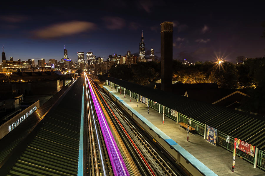 Chicago skyline and train lights Photograph by Sven Brogren