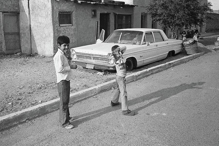 Child with broken arm and slingshot Naco Sonora Mexico 1980 Photograph by David Lee Guss