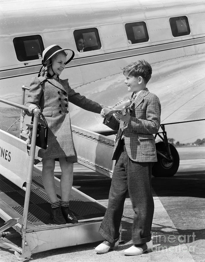 Children Exiting A Plane Photograph by H. Armstrong Roberts/ClassicStock