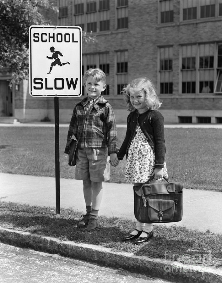 Children Next To Slow Traffic Sign Photograph by H. Armstrong Roberts/ClassicStock