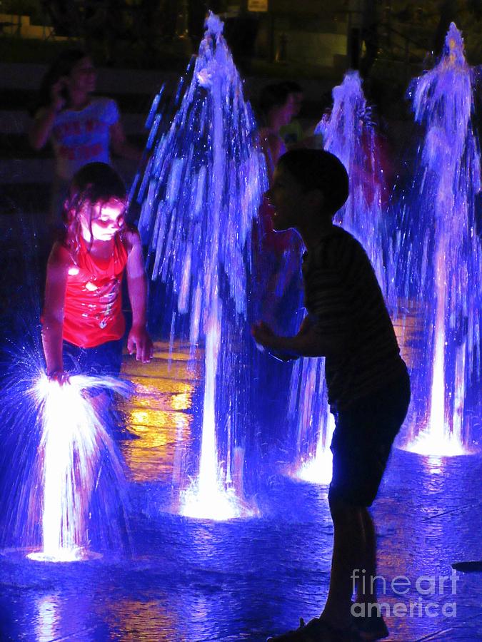 Fountain Photograph - Children Playing in Beautiful Fountain Waters by Crystal Loppie