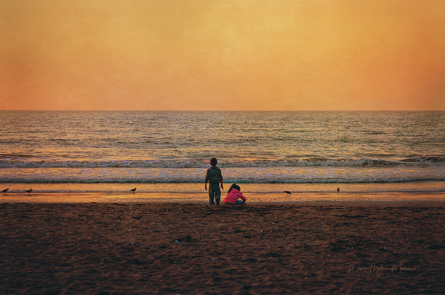 Children Playing In The Sand At Sunset Photograph by Maria Angelica Maira