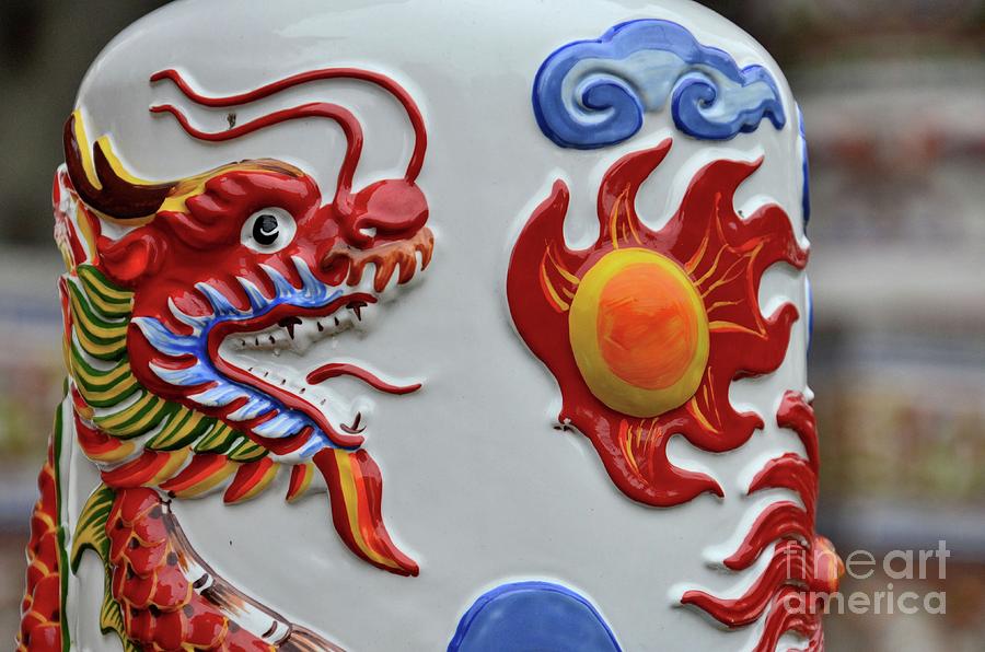 Chinese dragon breathes fire on ceramic art at temple Hat Yai Thailand Photograph by Imran Ahmed