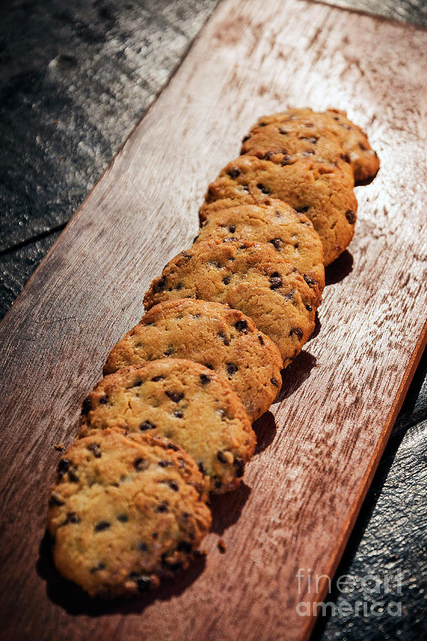 Chocolate Chip Cookie Biscuits On Wooden Board Photograph by JM Travel Photography