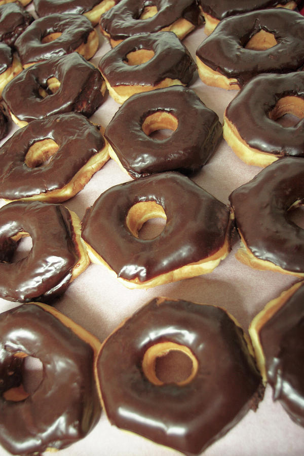 Chocolate Covered Donuts Photograph by Todd Klassy
