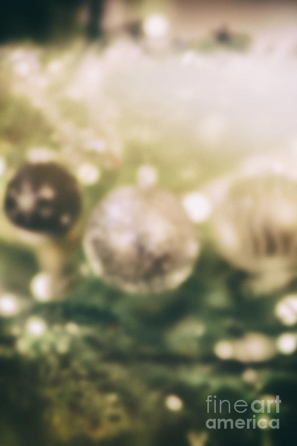 Blurred Christmas background with baubles Photograph by Patricia Hofmeester