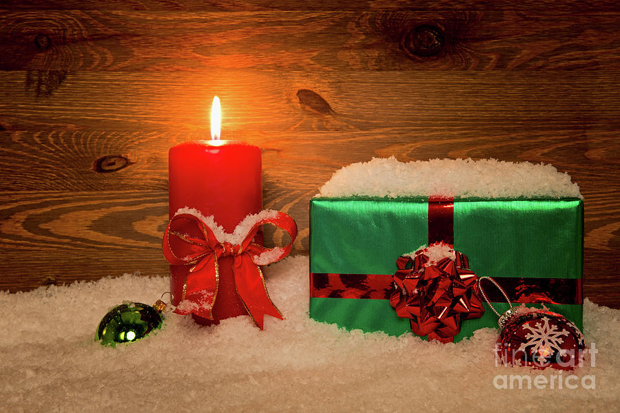 Christmas Gift And Candle Photograph