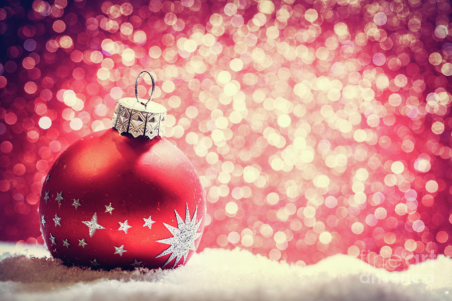 Christmas glass ball in snow. Glitter background Photograph by Michal ...