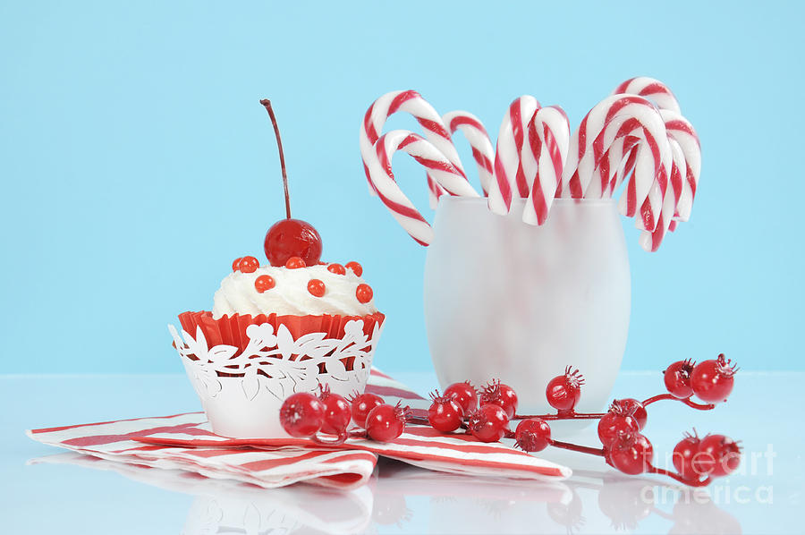 Christmas party candy canes  Photograph by Milleflore Images