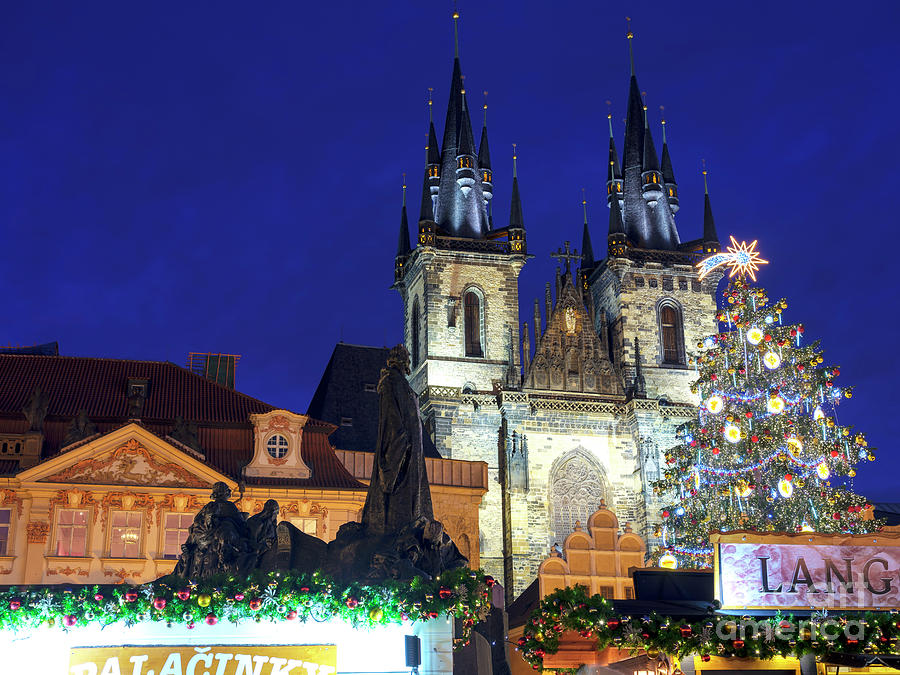 Christmas Star in Old Town Square Prague Photograph by John Rizzuto