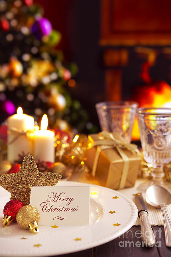 Christmas Table With Fireplace And Christmas Tree In The Back