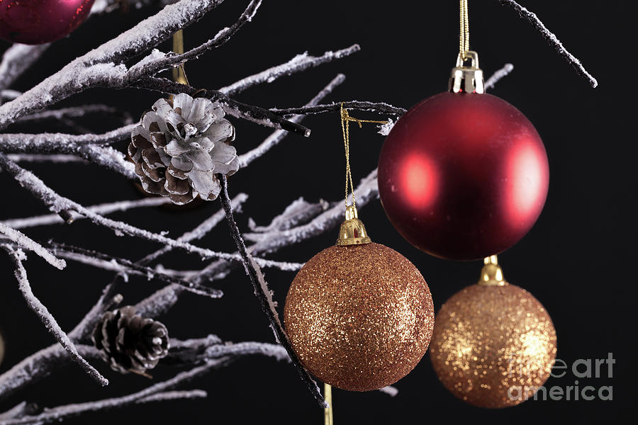 Christmas tree balls close up Photograph by Simon Bratt