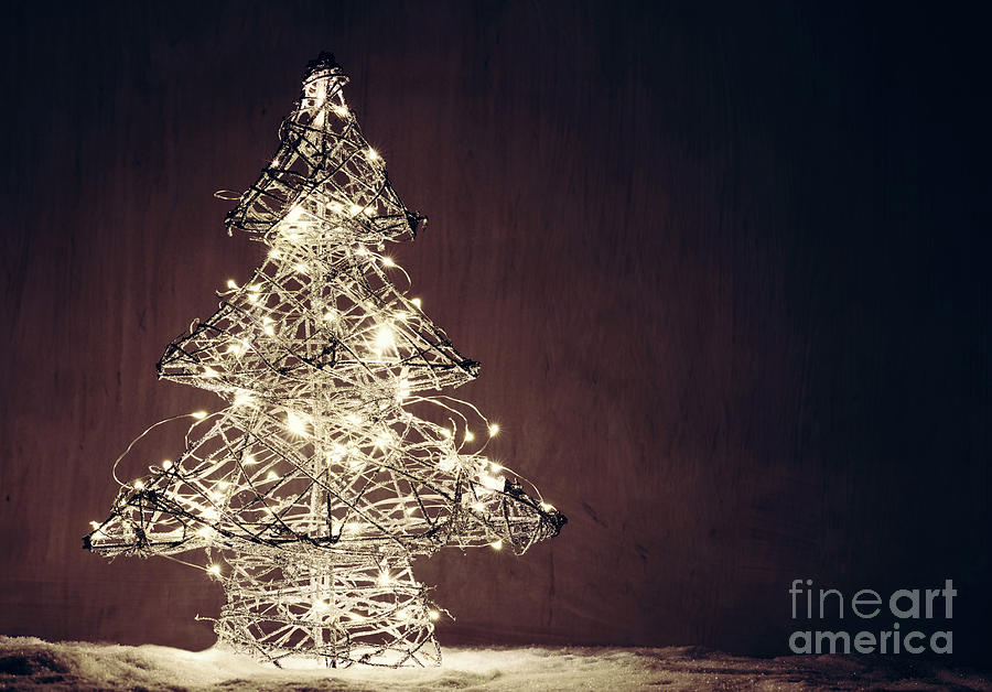 Christmas tree shape made of lights. Photograph by Michal Bednarek