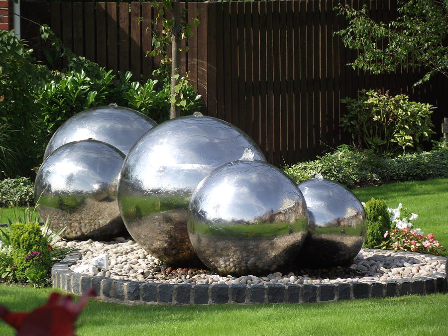 Chrome Steel water feature Photograph by Dawn Hay