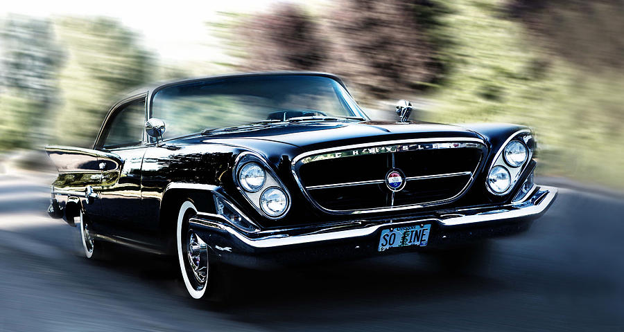 Chrysler in motion Photograph by Rebecca Cozart