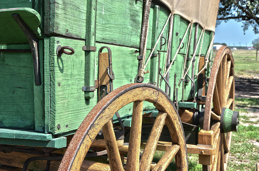 Chuck Wagon Wheels Photograph by James Woody